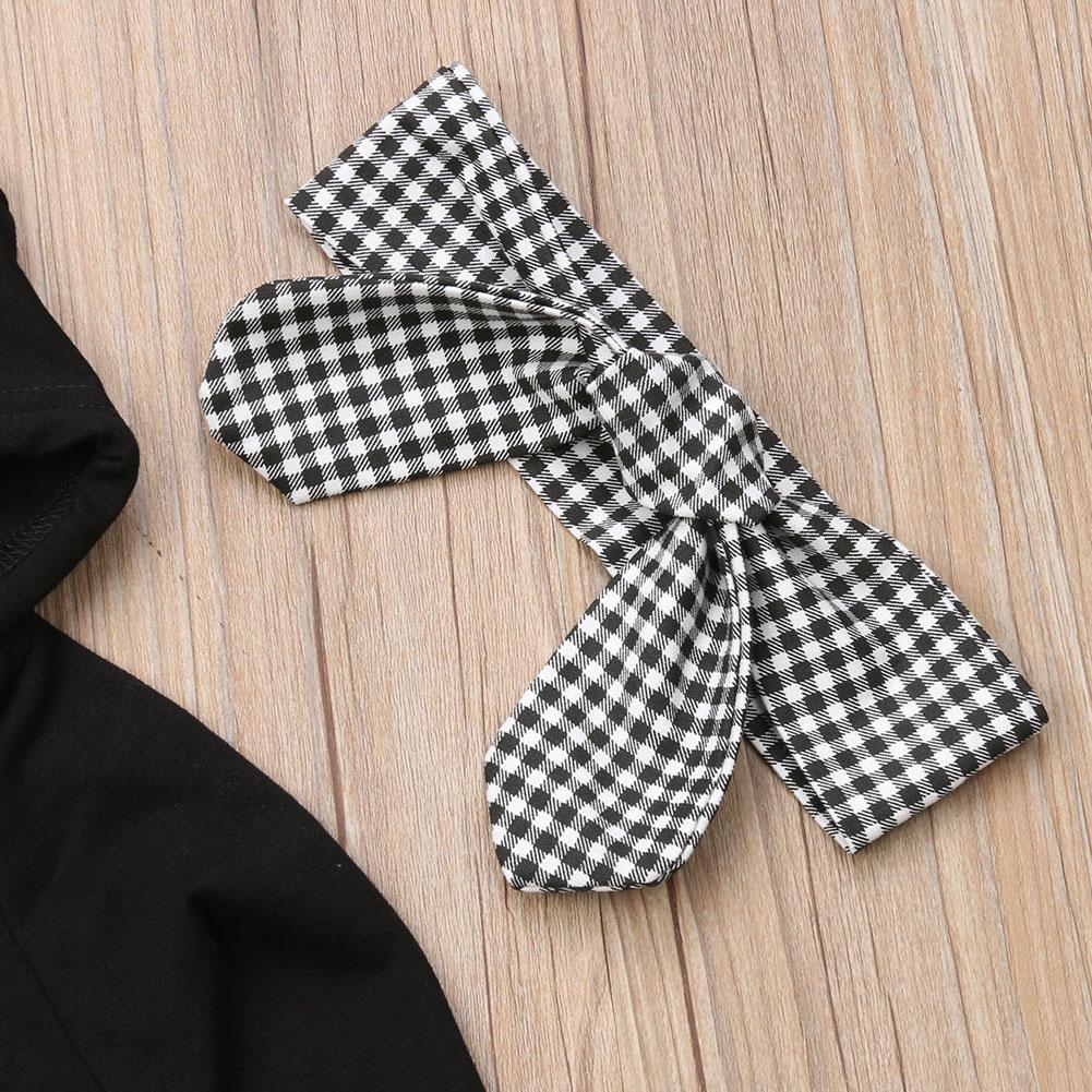 Stevvex two-piece toddler outfit: black hooded pullover and black-white checkered headband on Tampa Home & Garden Store