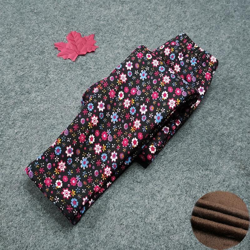 Stevvex kids thick floral leggings in black with colorful flowers, folded display on Tampa Home & Garden Store