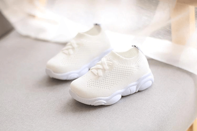 Stevvex white knit baby sneakers with lace closure and soft anti-slip sole pair on Tampa Home & Garden Store