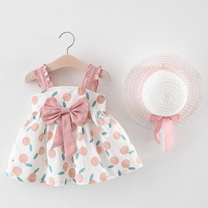 Newborn baby girl dress set with hat by Stevvex, white peach-print pattern with pink bows on Tampa Home & Garden Store