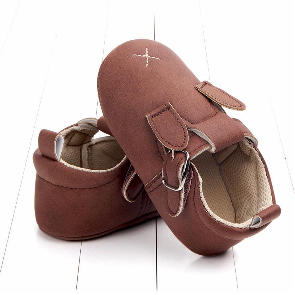 Baby moccasin shoes pair brown leather with buckle straps and soft lining for first steps on Tampa Home & Garden Store