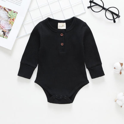Stevvex black ribbed baby bodysuit romper with long sleeves, two chest buttons, bottom snaps on Tampa Home & Garden Store