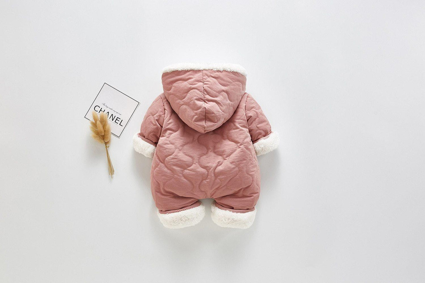 Stevvex pink baby jumpsuit with hood, plush cotton, quilted design and white faux fur cuffs on Tampa Home & Garden Store