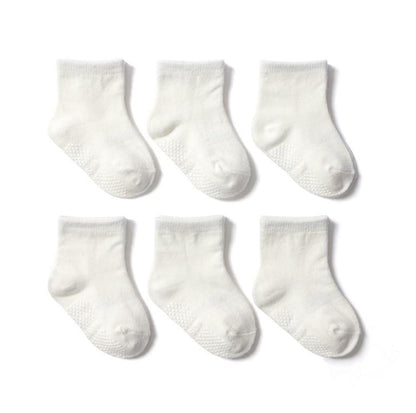 Six pairs white cotton baby socks with non-slip grips, low-cut boat style on Tampa Home & Garden Store
