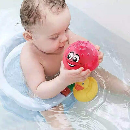 Stevvex bath toy set pink smiling spiky ball and yellow rubber duck float in the tub on Tampa Home & Garden Store