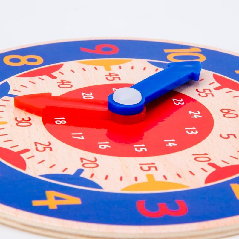 Montessori wooden clock toy by Stevvex with colorful numbers and blue-red hands for kids on Tampa Home & Garden Store