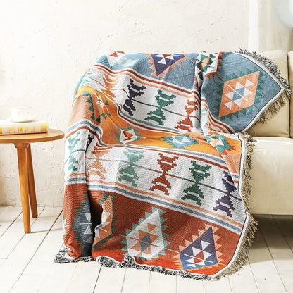 DecorBites Knitted Nordic Plaid Blanket cozy sofa throw in orange teal tones on Tampa Home & Garden Store