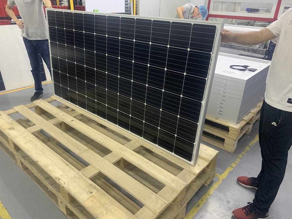 SUNFUTURE 1000W solar panel off-grid system with black PV cells on a wooden pallet on Tampa Home & Garden Store