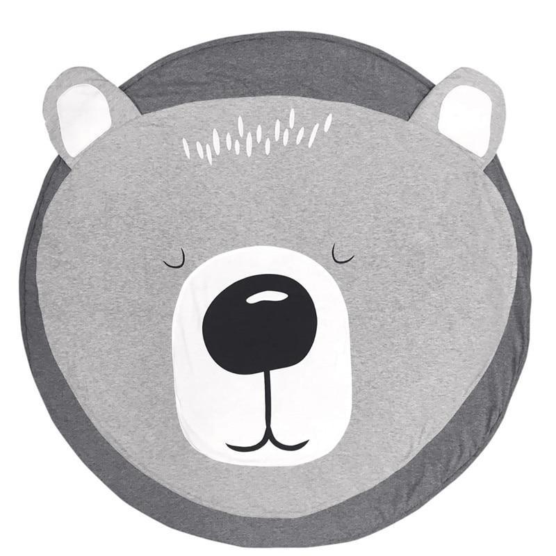 Round cotton baby play mat with gray bear face design and soft plush surface by Stevvex on Tampa Home & Garden Store