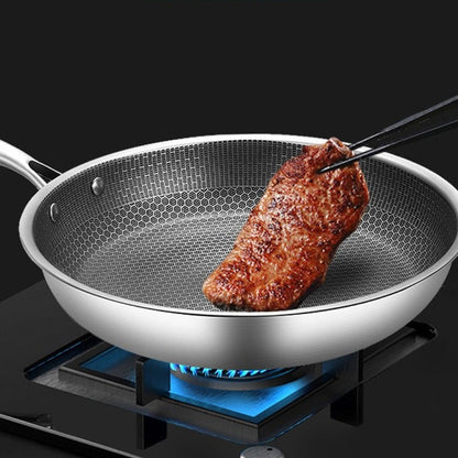 ChefSeries frying pan by Moktan Sabai with honeycomb stainless steel on gas stove on Tampa Home & Garden Store
