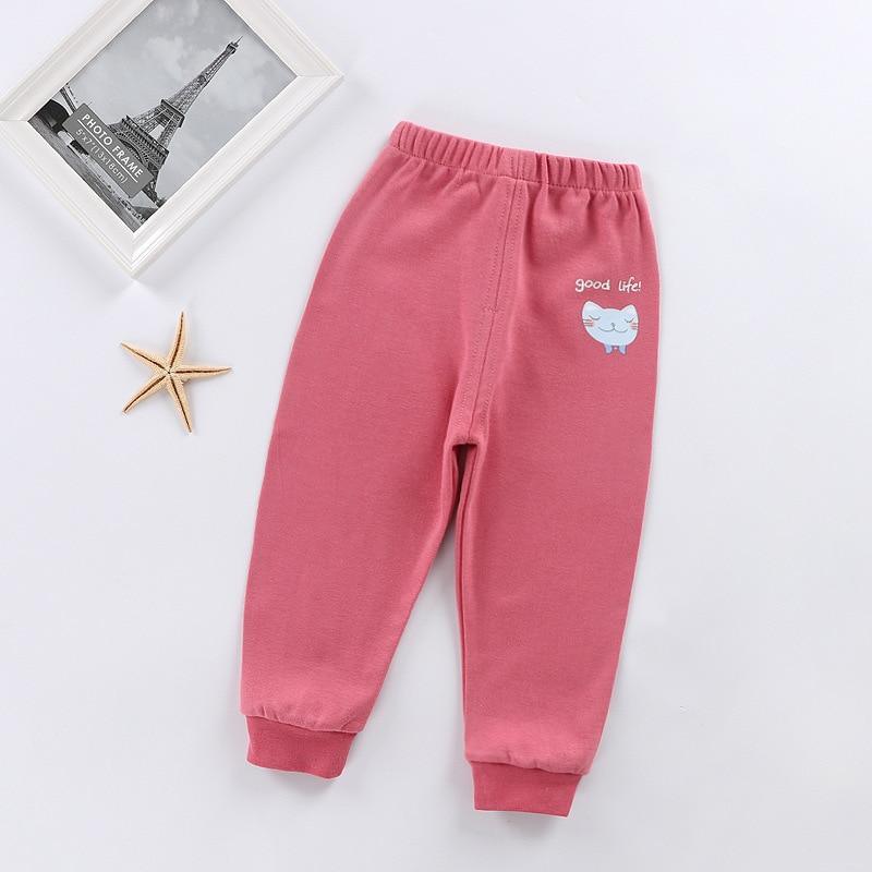 Baby pink cotton pants by Stevvex with elastic waist and cuffs, blue cartoon cat graphic on Tampa Home & Garden Store