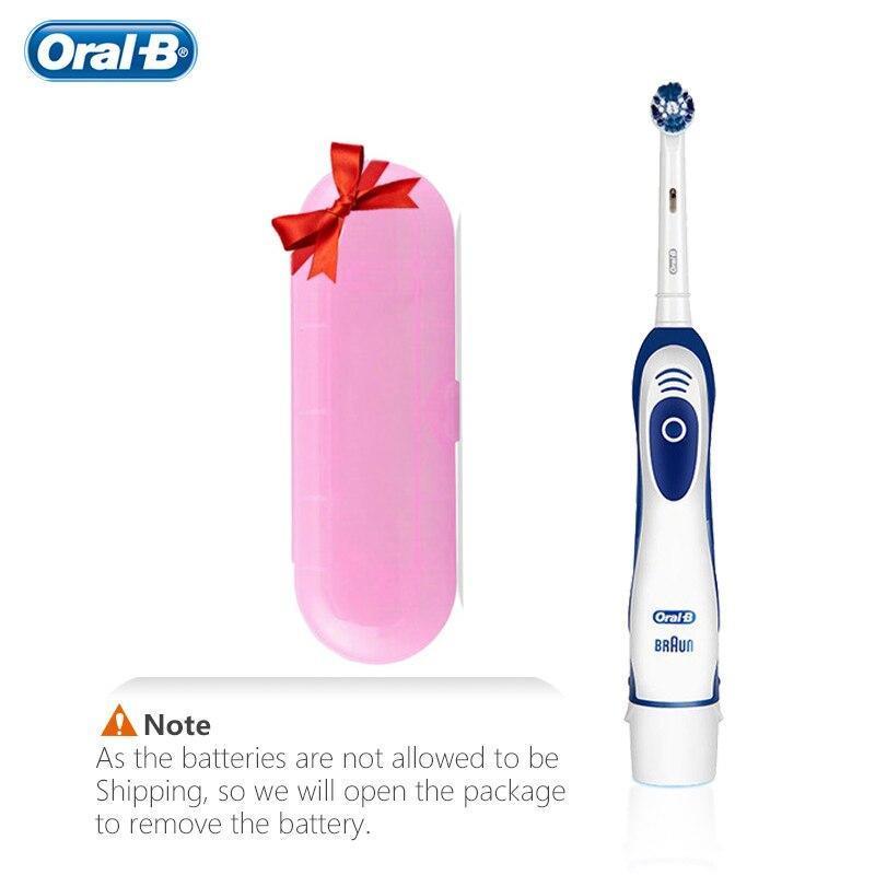 Sonic vibration toothbrush by Oral-B with blue white handle next to a pink gift box on Tampa Home & Garden Store