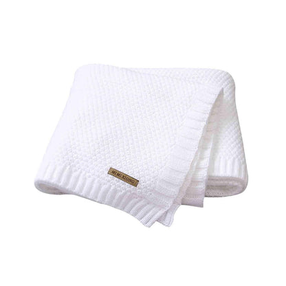 White knitted baby swaddle blanket, soft newborn wrap with MI MIKONG tag on Tampa Home & Garden Store