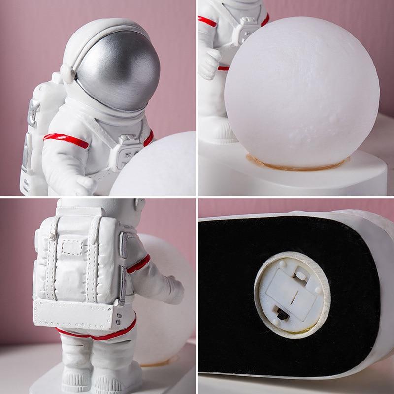 STEVVEX astronaut night light white spaceman with silver helmet moon ball on base on Tampa Home & Garden Store