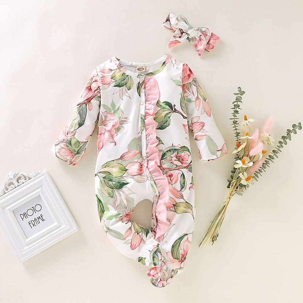 Floral baby romper with long sleeves and footed legs, pink ruffle trim, matching headband on Tampa Home & Garden Store