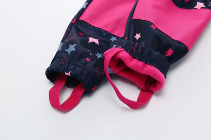 Stevvex kids' ski jumpsuit navy with pink star print and pink fleece lining, elastic cuffs on Tampa Home & Garden Store