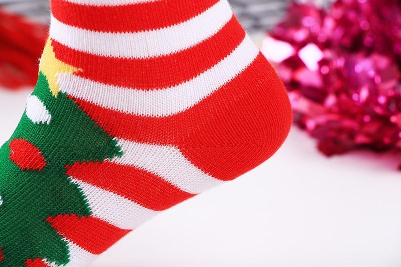 Baby Christmas socks Stevvex; cotton red and white striped with green tree motif on Tampa Home & Garden Store