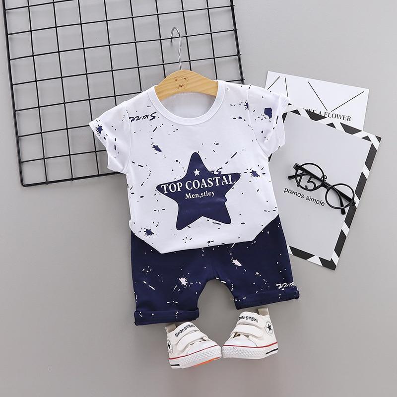 Stevvex baby boys two-piece star camouflage tracksuit top and navy pants costume set on Tampa Home & Garden Store