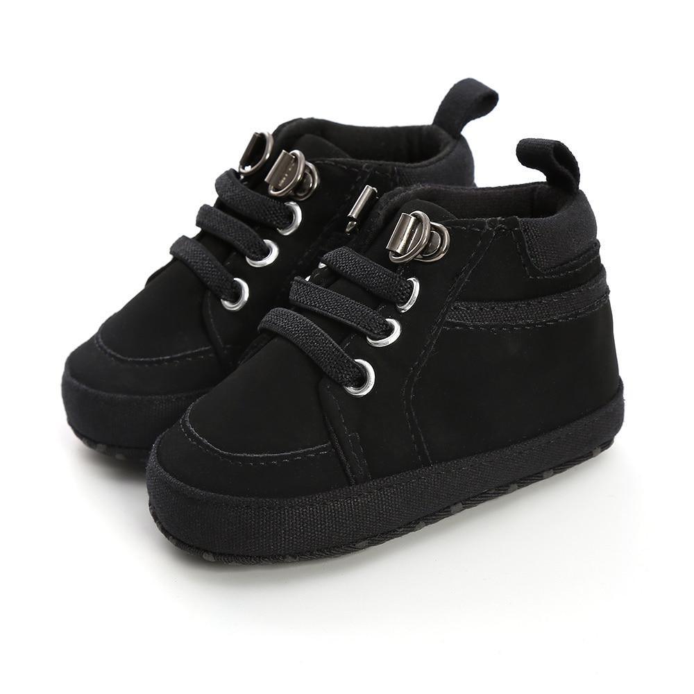 Warm newborn first walkers soft sole shoes by Stevvex, black fabric upper with metal eyelets on Tampa Home & Garden Store