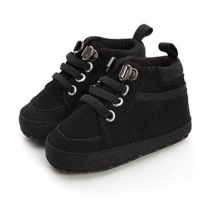 Warm newborn first walkers soft sole shoes by Stevvex, black fabric upper with metal eyelets on Tampa Home & Garden Store