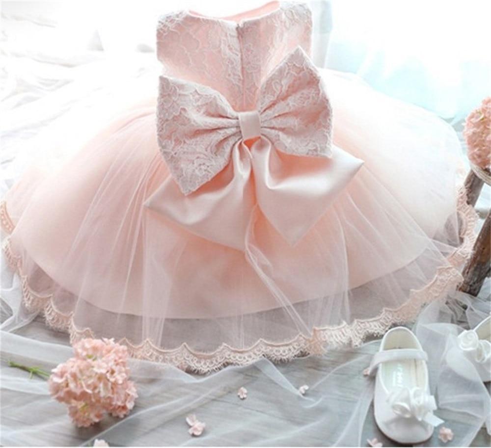 Pink baby gown with lace bow and tulle skirt with white shoe on Tampa Home & Garden Store on Tampa Home & Garden Store