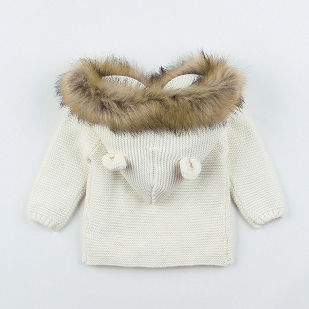 Knit hooded baby coat with faux fur-trimmed hood in cream by Stevvex for boys and girls on Tampa Home & Garden Store