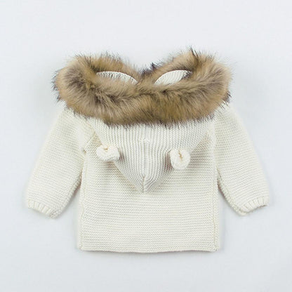 Knit hooded baby coat with faux fur-trimmed hood in cream by Stevvex for boys and girls on Tampa Home & Garden Store