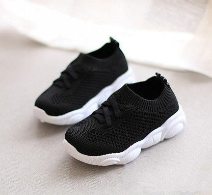 Baby and toddler Stevvex sneakers pair in black knit with white non-slip sole casual shoes on Tampa Home & Garden Store