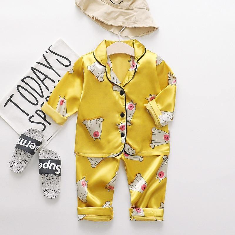 2-piece yellow ice silk satin kids pajama set by Stevvex with cartoon bear prints on Tampa Home & Garden Store