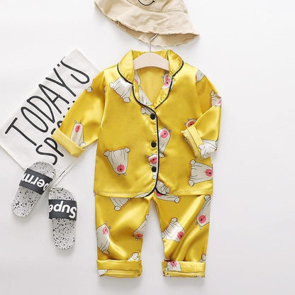 2-piece yellow ice silk satin kids pajama set by Stevvex with cartoon bear prints on Tampa Home & Garden Store