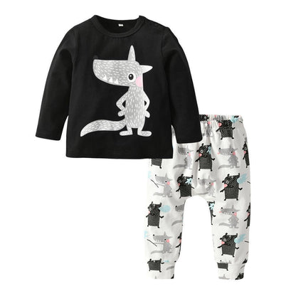 Stevvex newborn 2pc outfit black shirt with gray dinosaur graphic and white dinosaur-print pants on Tampa Home & Garden Store