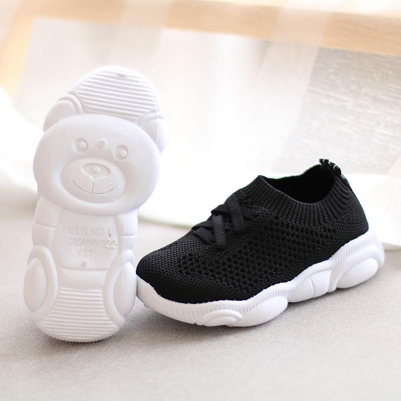 Stevvex baby sneaker black knit upper with white chunky anti-slip sole white bear prop on Tampa Home & Garden Store