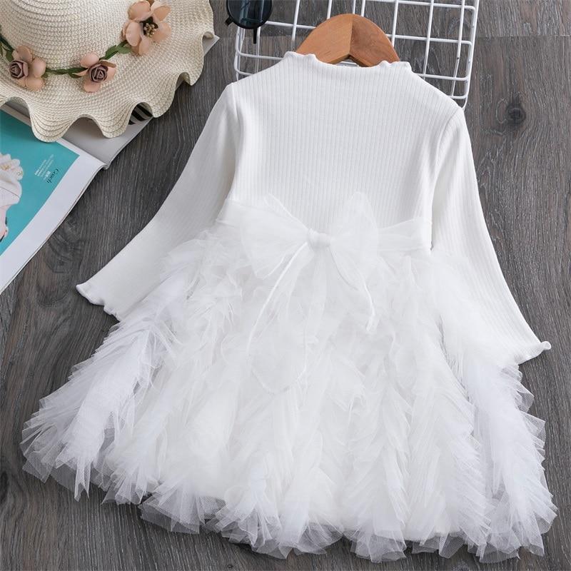 Stevvex white long-sleeve baby dress with ribbed bodice and tulle skirt bow on Tampa Home & Garden Store