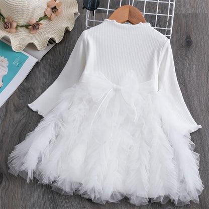 Stevvex white long-sleeve baby dress with ribbed bodice and tulle skirt bow on Tampa Home & Garden Store