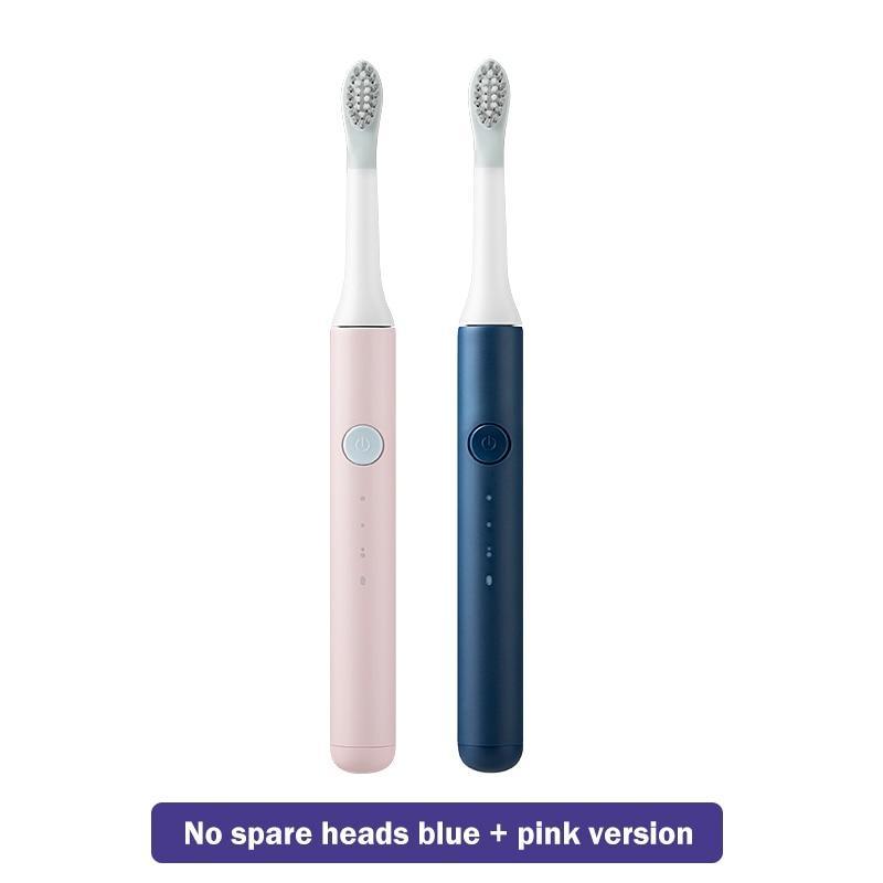 Stevvex sonic electric toothbrush pair in pink and navy with brush heads on Tampa Home & Garden Store