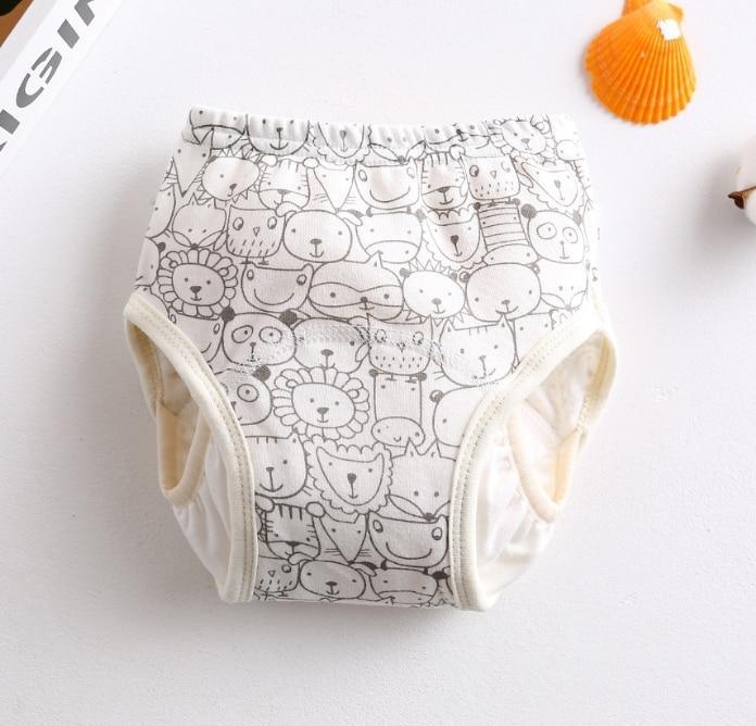 Stevvex 8-layer reusable cloth diaper in white with animal print, leak-proof sides on Tampa Home & Garden Store