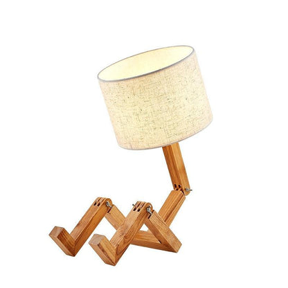 Stevvex wood robot-shape folding table lamp with beige linen shade on Tampa Home & Garden Store