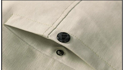 Cotton jacket cuff close-up with black button labeled FASHION on Tampa Home & Garden on Tampa Home & Garden Store