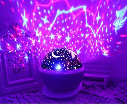 LED starry night projector lamp by Stevvex projecting moon and stars in purple on Tampa Home & Garden Store