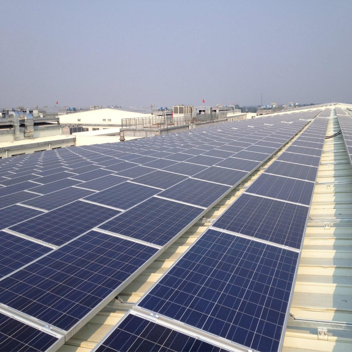 SUNFUTURE 1000W off-grid solar panel system on a rooftop with blue PV panels on Tampa Home & Garden Store