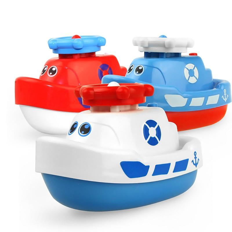Bath toy boats set by Stevvex featuring three cartoon ships in red blue and rotating water jets on Tampa Home & Garden Store
