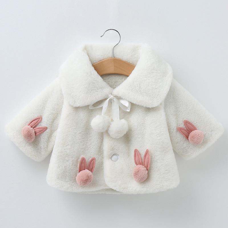 Princess baby girls white faux fur coat by Stevvex with pink bunny patches and pom poms on Tampa Home & Garden Store
