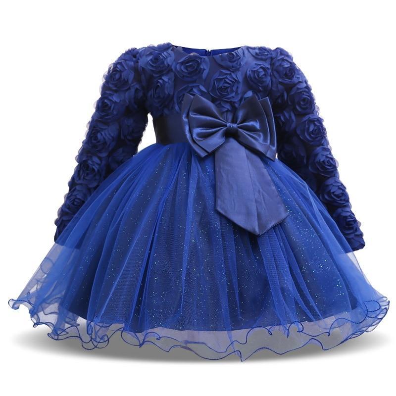 Baby christening gown in royal blue with rose-embellished sleeves and glitter tulle skirt on Tampa Home & Garden Store