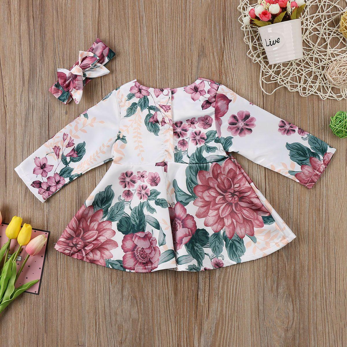 Stevvex infant floral dress with long sleeves and matching headband pink blooms on white on Tampa Home & Garden Store