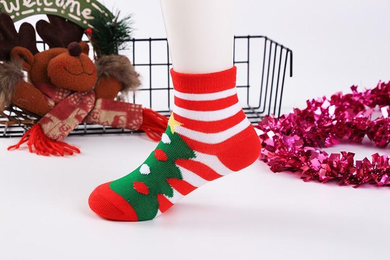 Stevvex cotton baby Christmas sock with red striped leg and green tree motif on Tampa Home & Garden Store