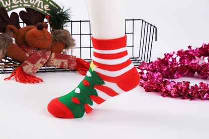 Stevvex cotton baby Christmas sock with red striped leg and green tree motif on Tampa Home & Garden Store