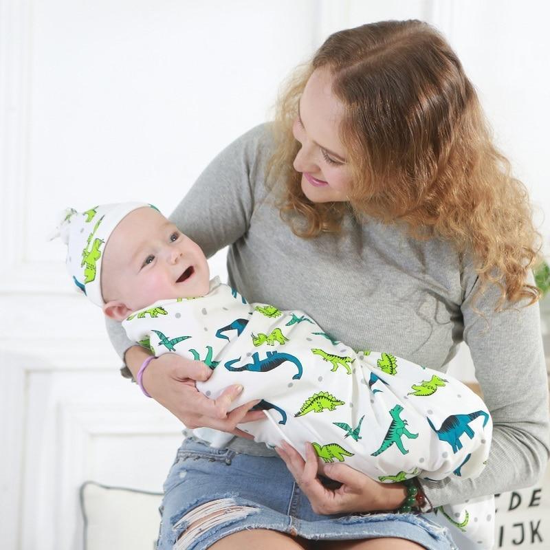 Newborn Stevvex swaddle wrap set with dinosaur print baby blanket and hat sleeping bag on Tampa Home & Garden Store