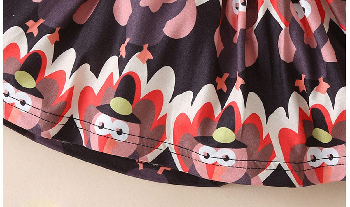 Newborn baby romper suspender dress Stevvex with cartoon flame pattern on dark fabric on Tampa Home & Garden Store