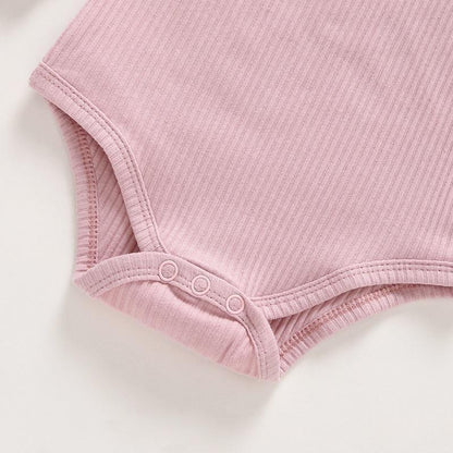 Baby bodysuit romper pink ribbed Stevvex with snap crotch closure on Tampa Home & Garden Store