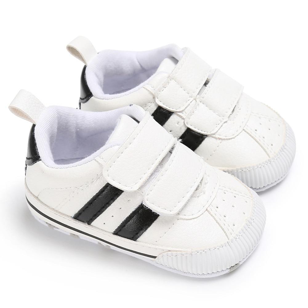 Stevvex baby sneakers white leather with hook-loop straps, black stripe, soft non-slip sole on Tampa Home & Garden Store